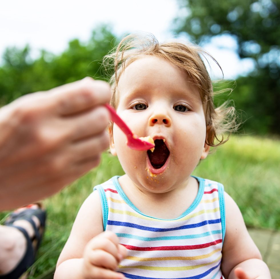 baby girl eating meal