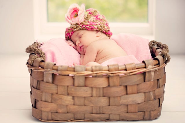 baby girl in basket