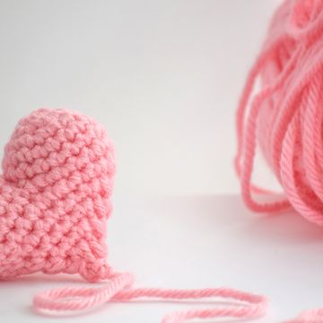 stuffed heart made of pink yarn
