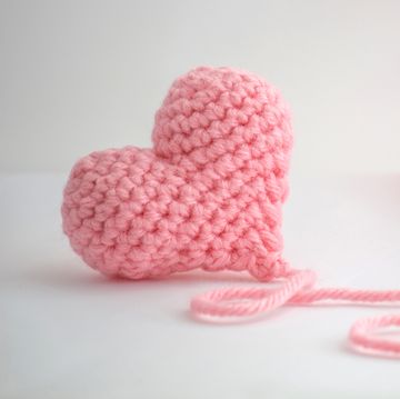 stuffed heart made of pink yarn