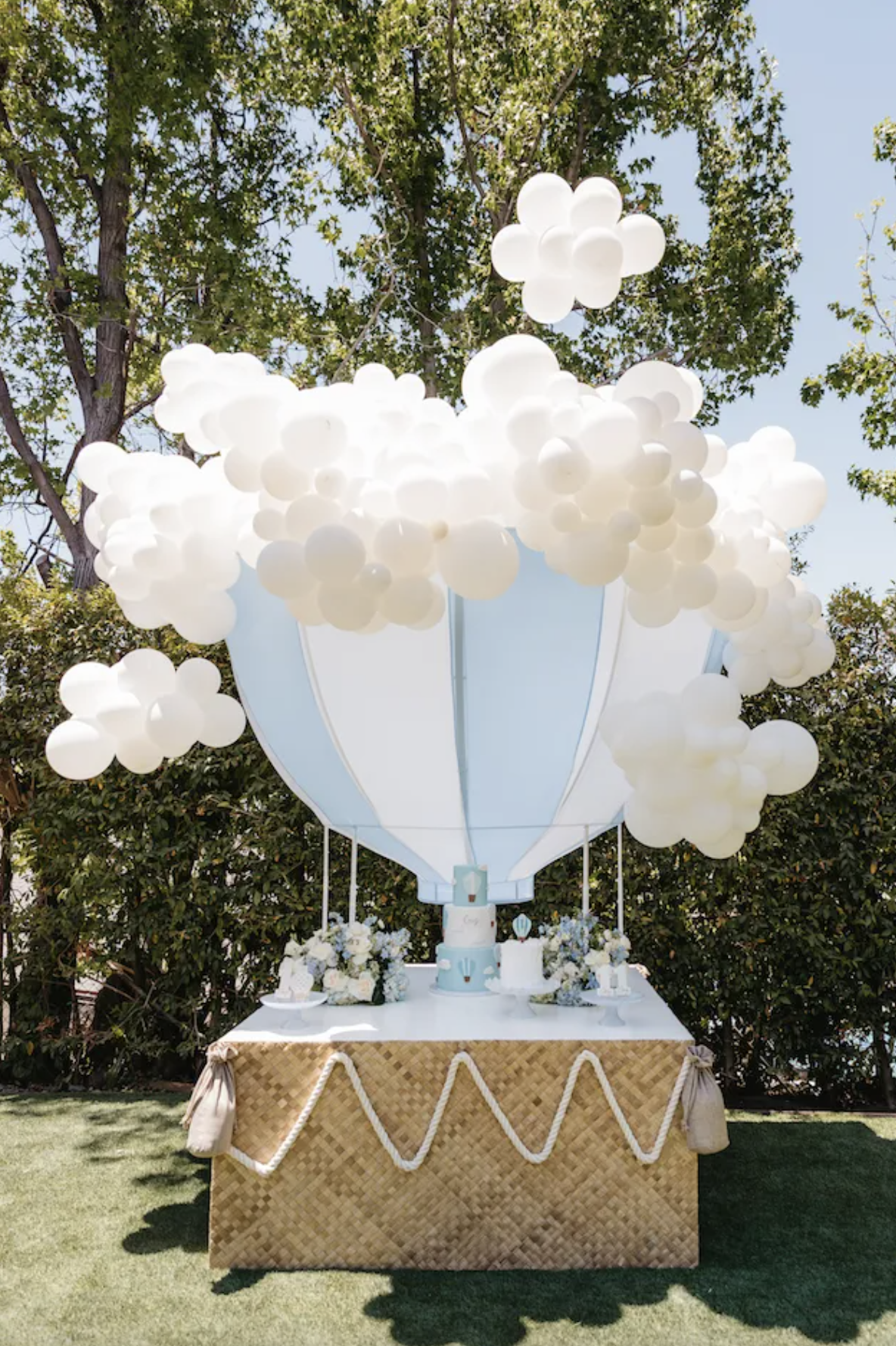boy baby shower theme with hot air balloon and clouds
