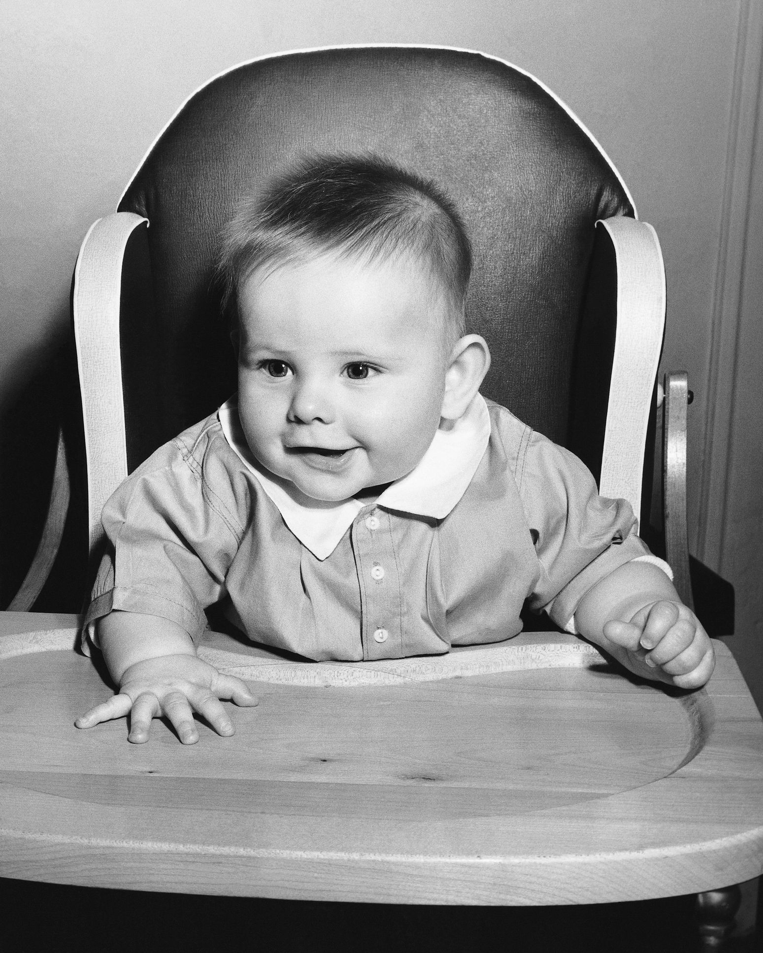 1940s 1950s creative smiling African-American boy toddler sitting