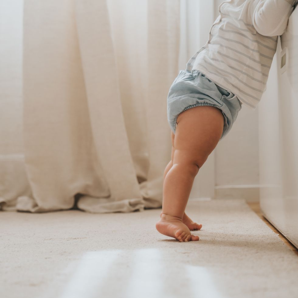 baby standing up for the first time