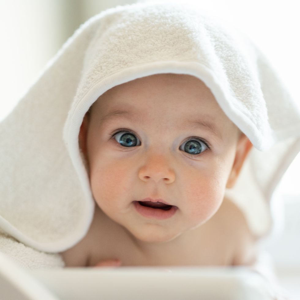 multicultural baby names, baby wearing towel after bath