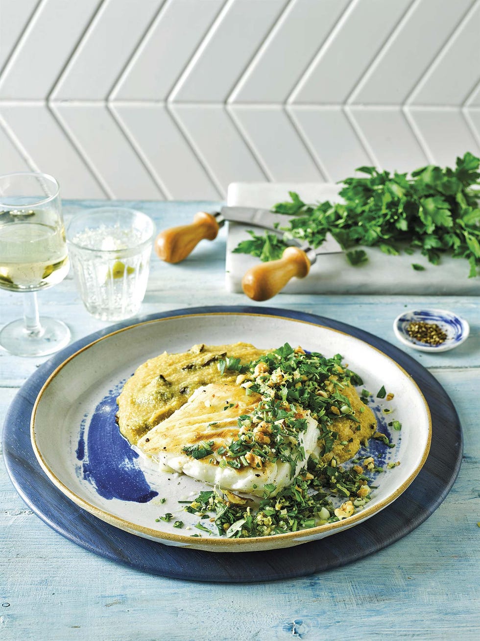 bacalao con base de polenta y gremolata de nueces