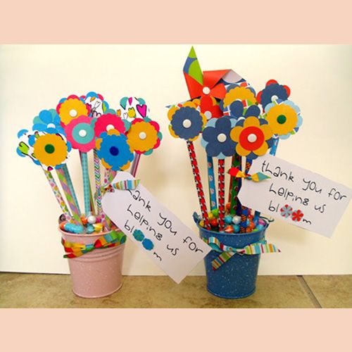 pencils decorated like flowers in a pot