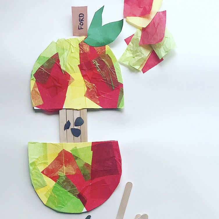 back to school activities an apple made from layered tissue paper and craft sticks