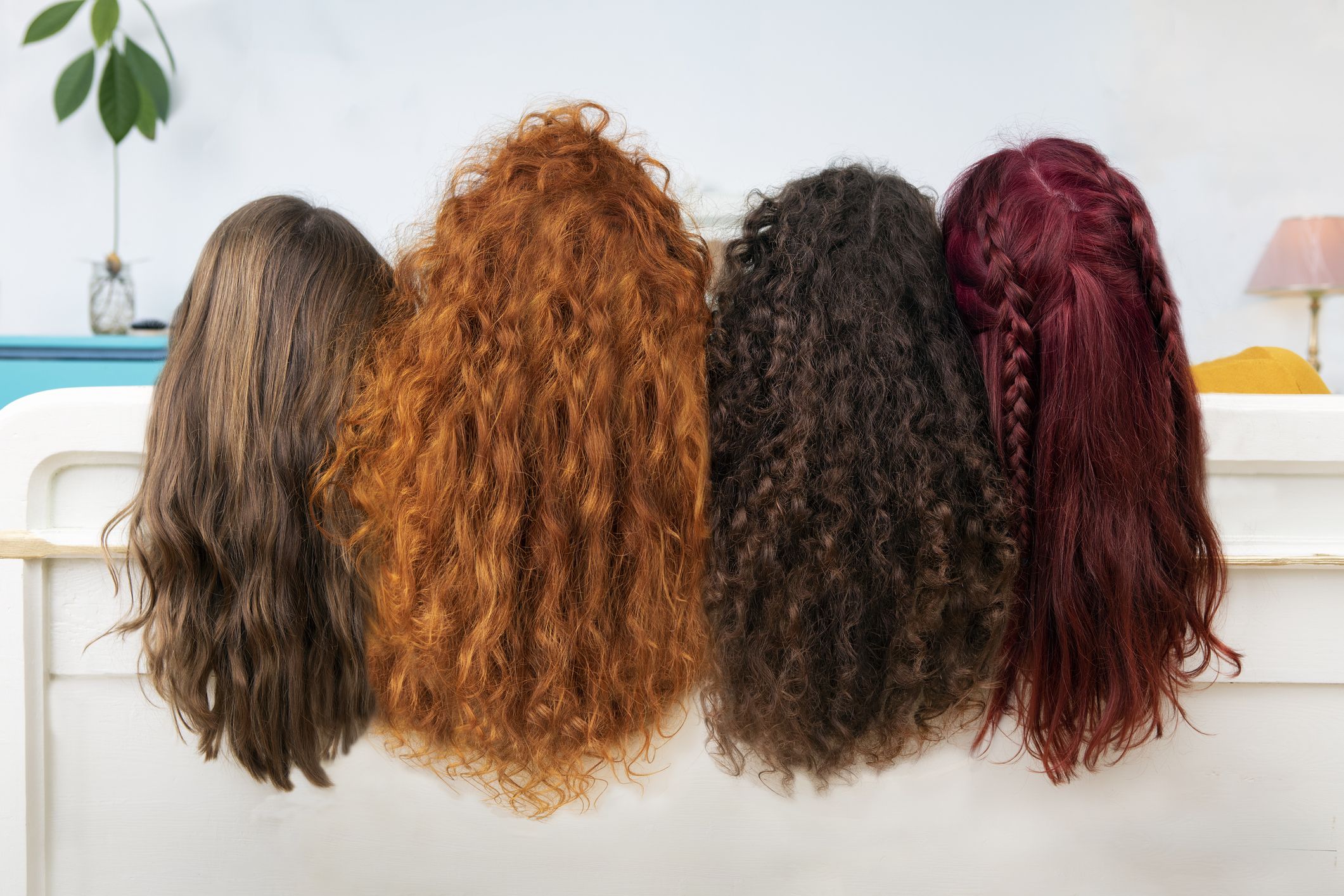 https://hips.hearstapps.com/hmg-prod/images/back-view-of-four-women-with-long-brown-and-red-royalty-free-image-1679527674.jpg