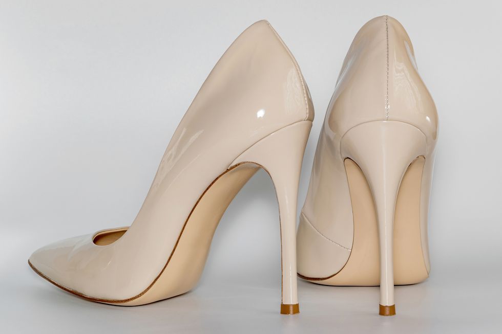 back view of the nude beige colored high heeled women's shoes