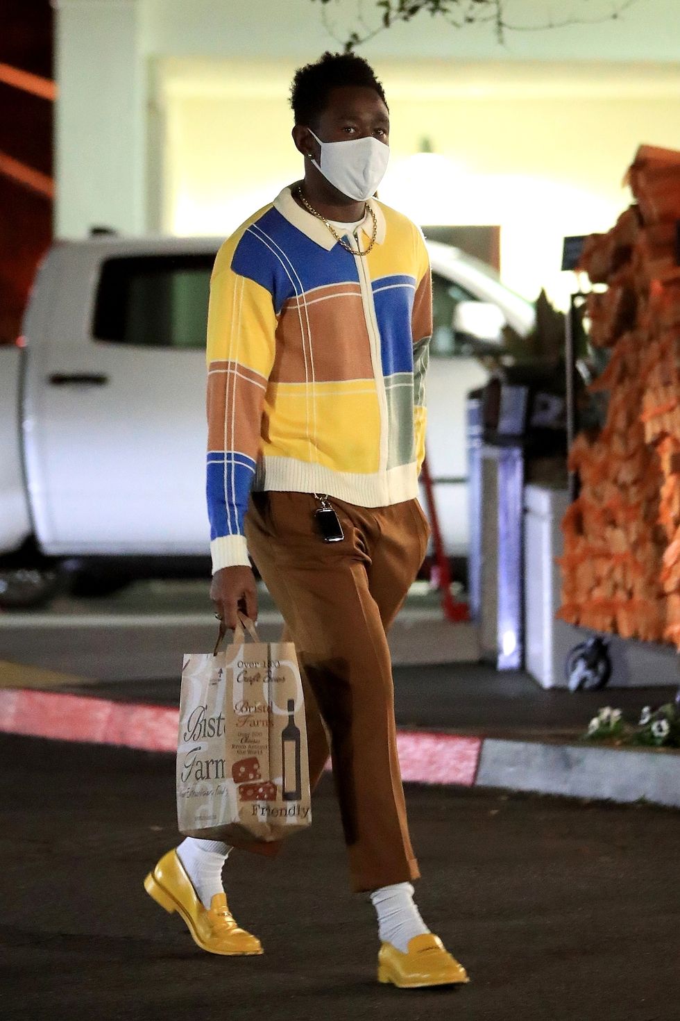 beverly hills, ca    exclusive tyler, the creator was spotted shopping for groceries wearing a yellow sweater and matching shoes at bristol farms in beverly hills tyler is wearing a uniqlo face maskpictured tyler, the creatorbackgrid usa 8 december 2020 usa 1 310 798 9111  usasalesbackgridcomuk 44 208 344 2007  uksalesbackgridcomuk clients   pictures containing childrenplease pixelate face prior to publication