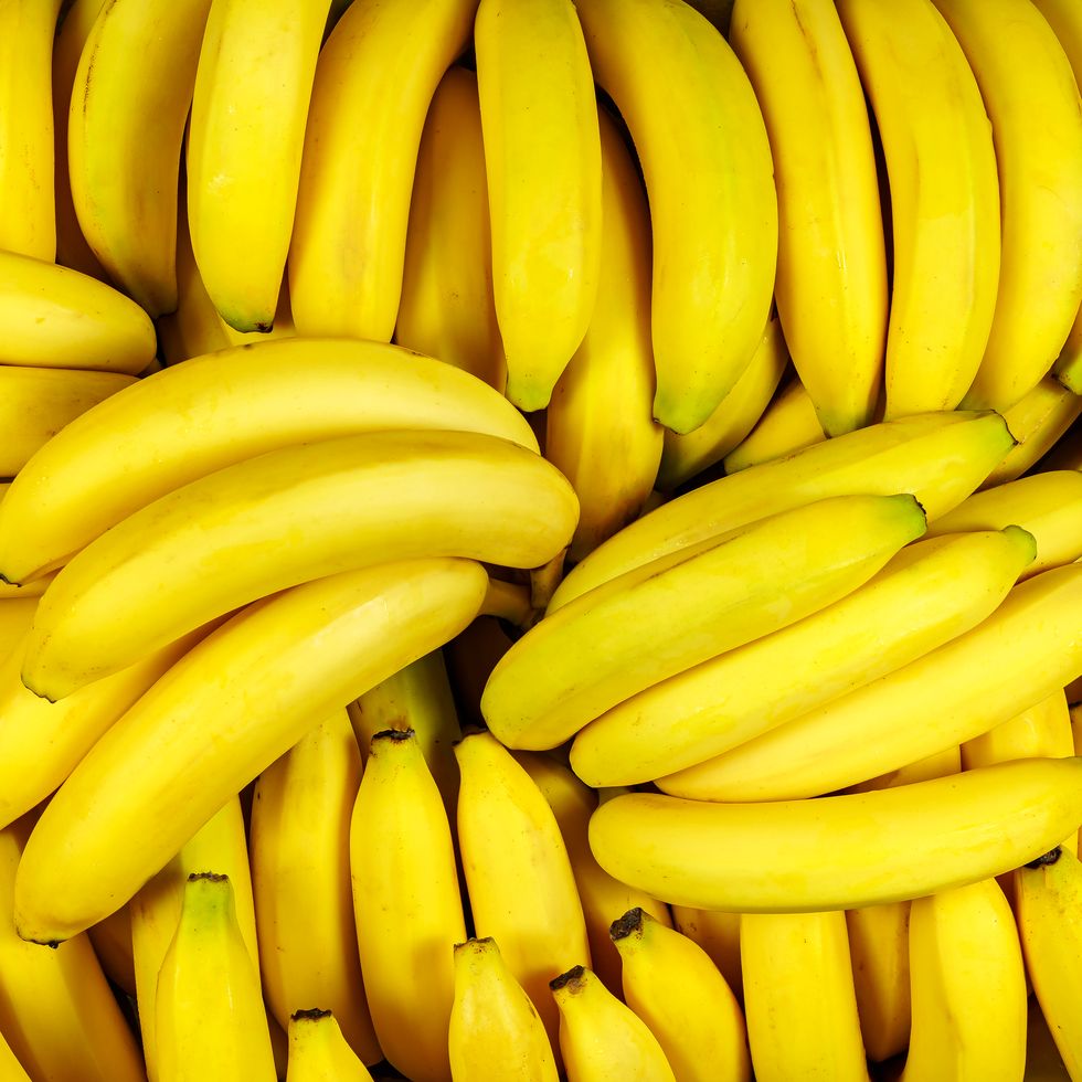 background of many banana pieces, overhead view, studio food photography.