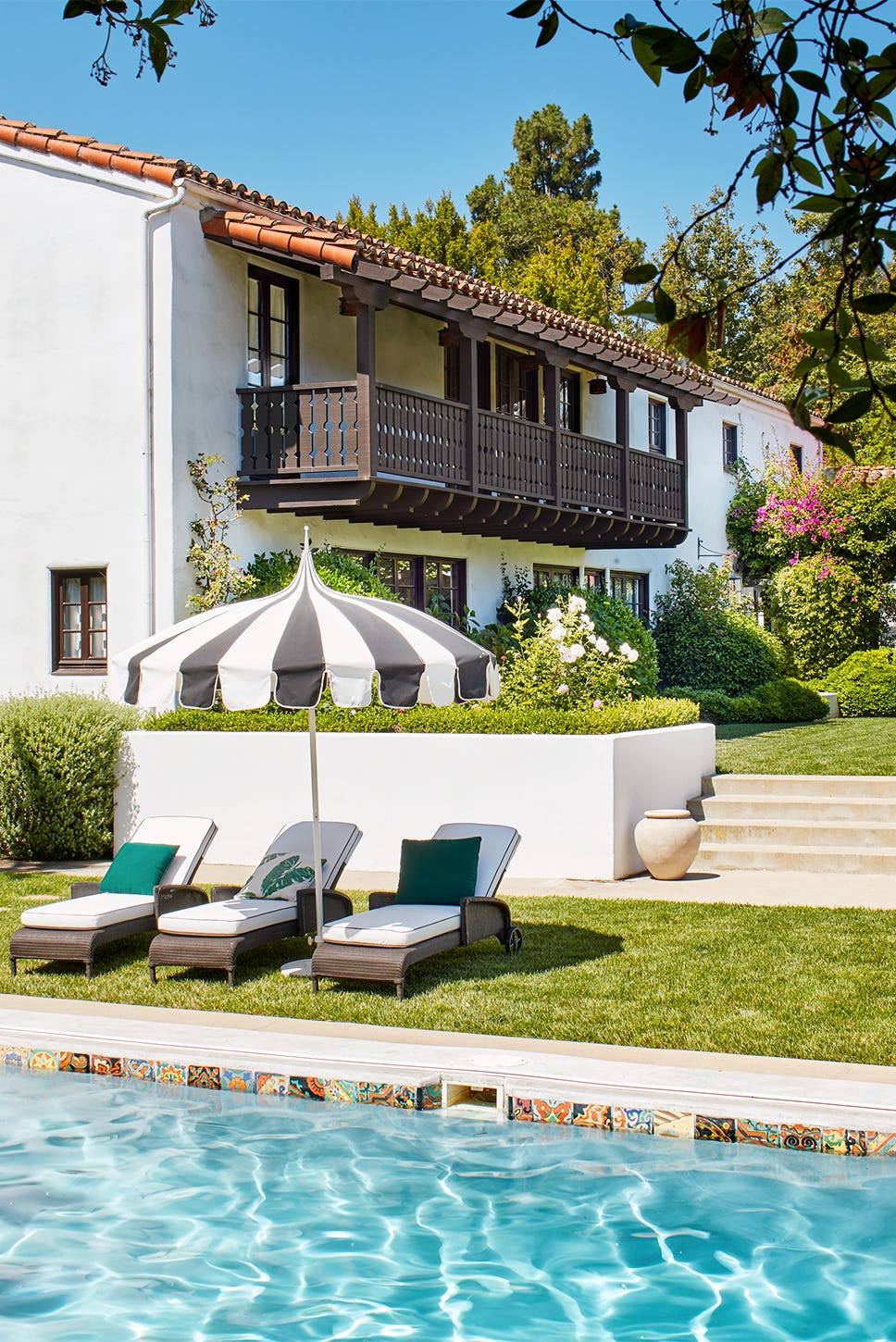 backyard in spanish style home with swimming pool backyard in spanish style home with swimming pool