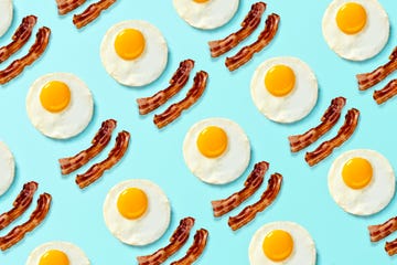 bacon and eggs pop art on a bright light blue background