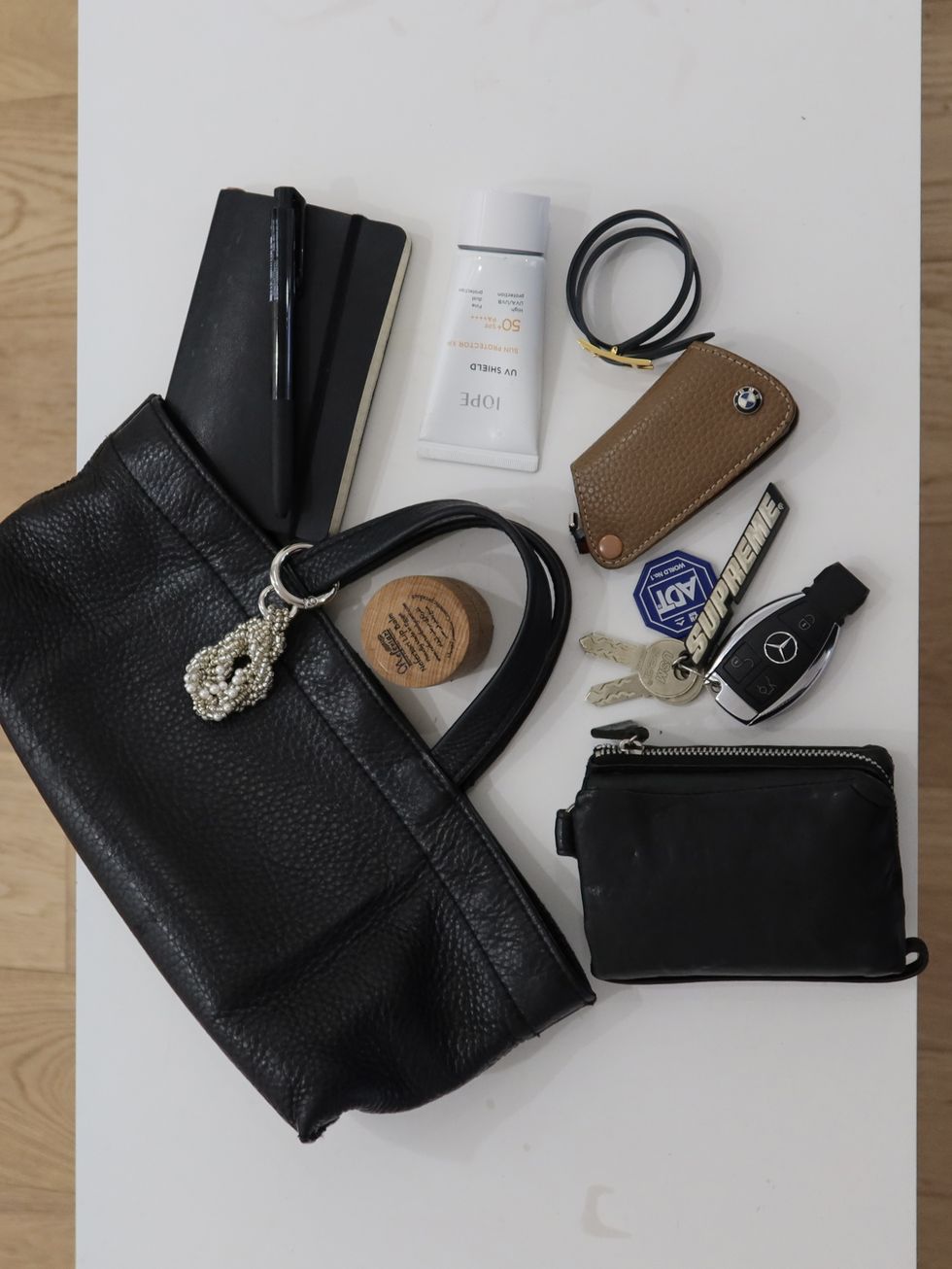 a purse and keys on a table