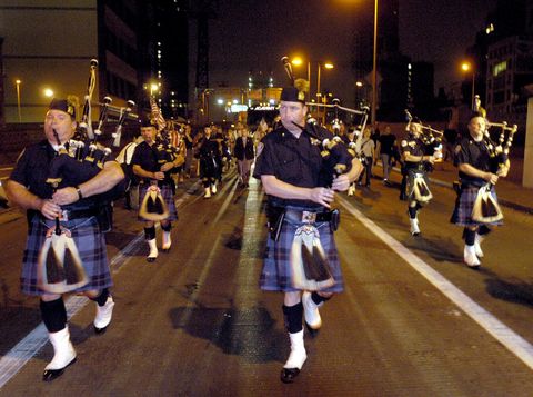 port authority bagpipers exit the 59th street bridge at 512 am on 11 september 2002 in new york city on their way to ground zero  they marched a total of 19 miles to honor those who lost their lives in the 11 september 2001 attacks   afp photoscott eells photo by    afp photo by  afp via getty images