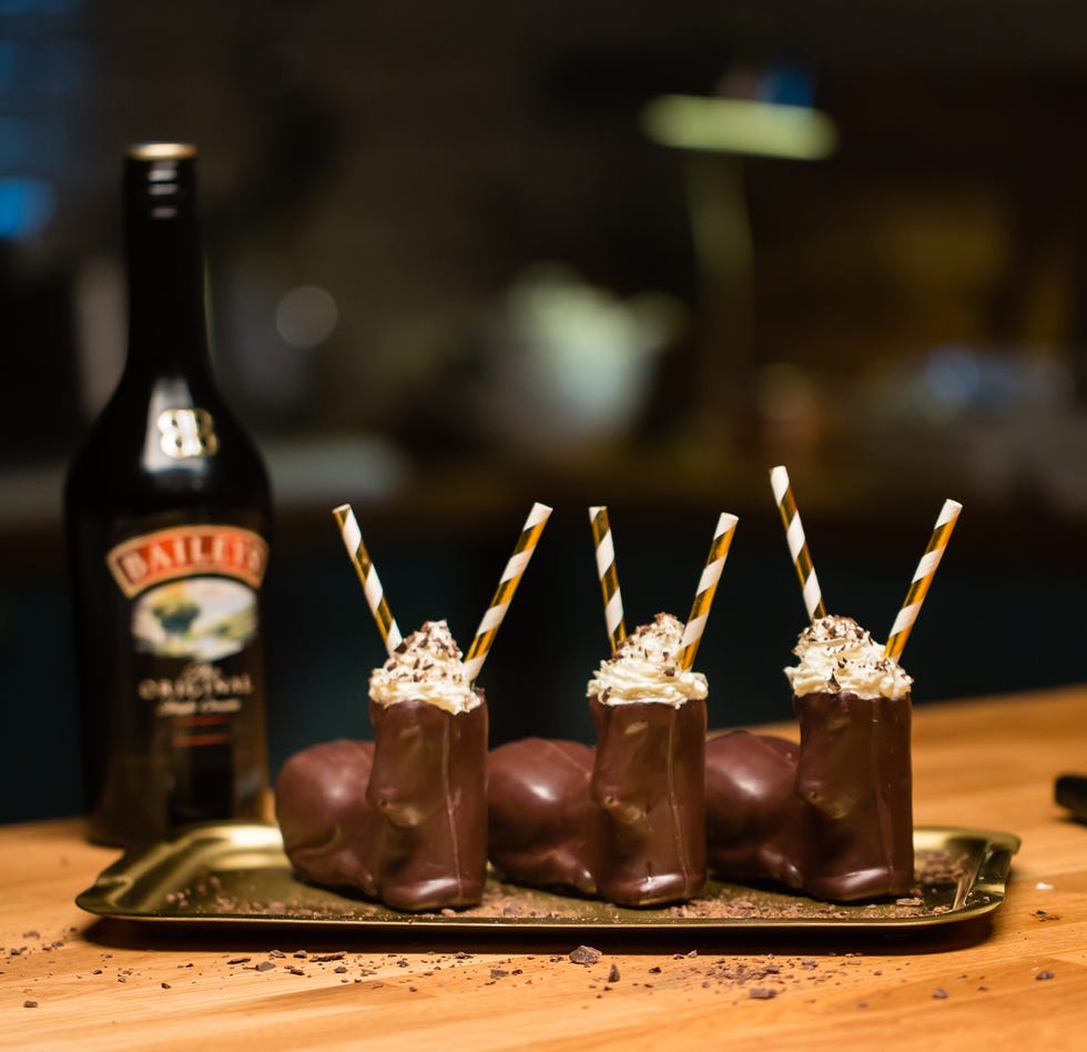 Drink, Bottle, Liqueur, Chocolate, Food, Distilled beverage, Glass bottle, Chocolate cake, Dessert, 