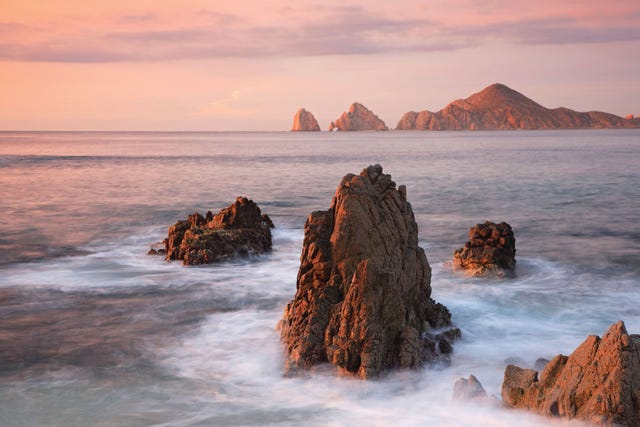rock formations and el arco the archbackground at land's end, cabo san lucas, baja california sur, mexico