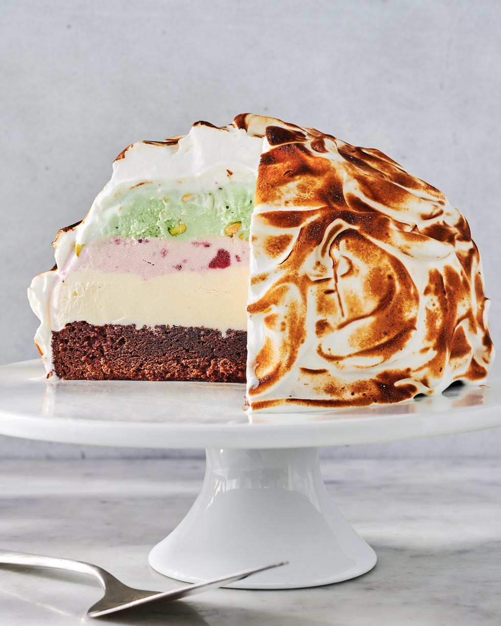 brownie base with chocolate, strawberry, and vanilla ice cream topped with toasted meringue