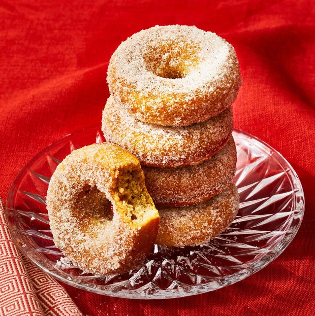 a plate of applesauce donuts