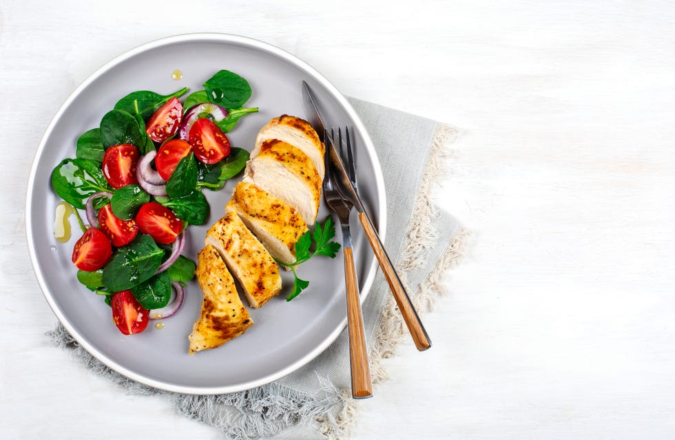 baked chicken fillet with vegetable salad healthy food