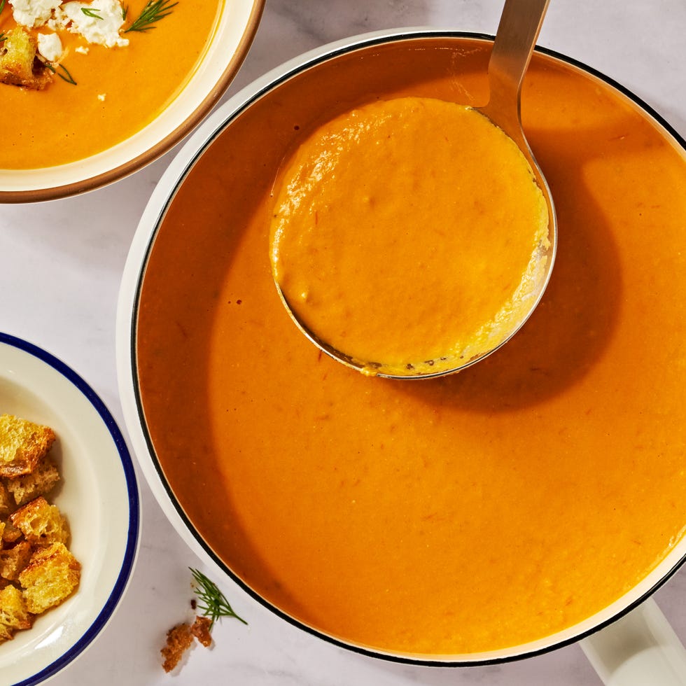 baked feta soup with crumbled feta and fresh dill