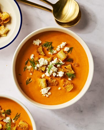 baked feta soup with crumbled feta and fresh dill