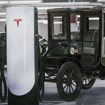 baker electric juicing up at a tesla supercharger