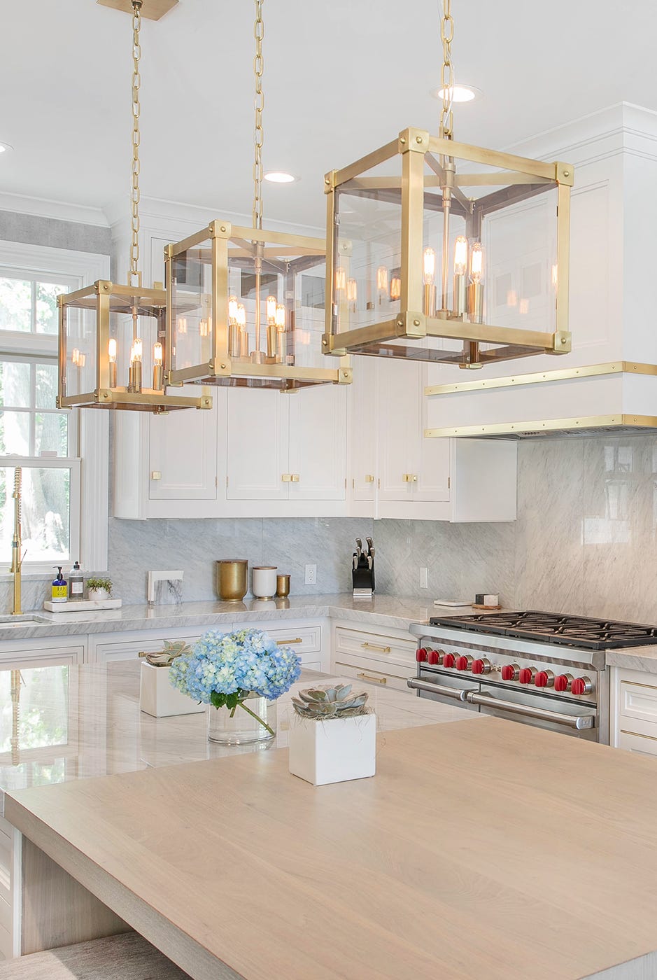 white kitchen with brass lighting white kitchen with brass lighting