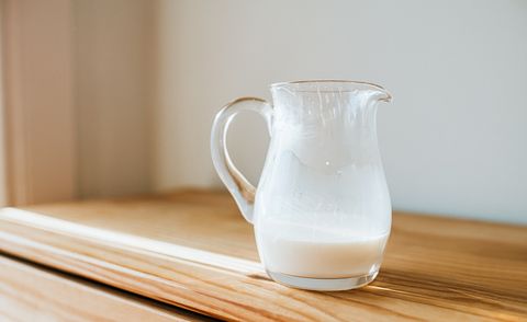 clear glass milk jug, space for copy