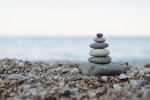 balanced stones on a pebble beach