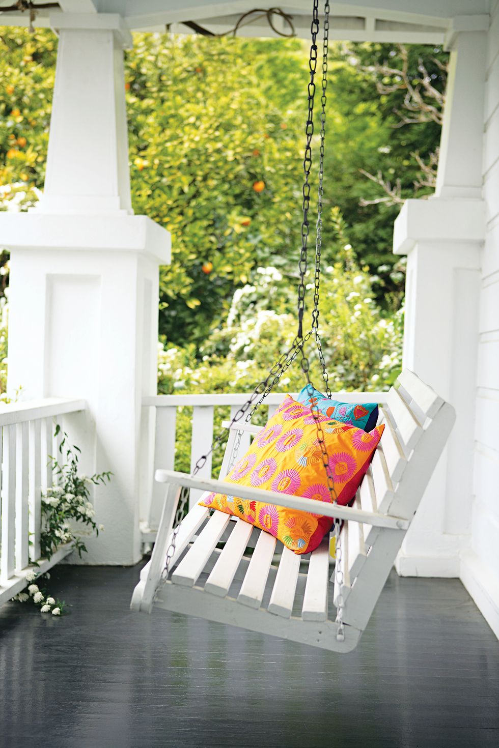 balcony with swing bench and pillows
