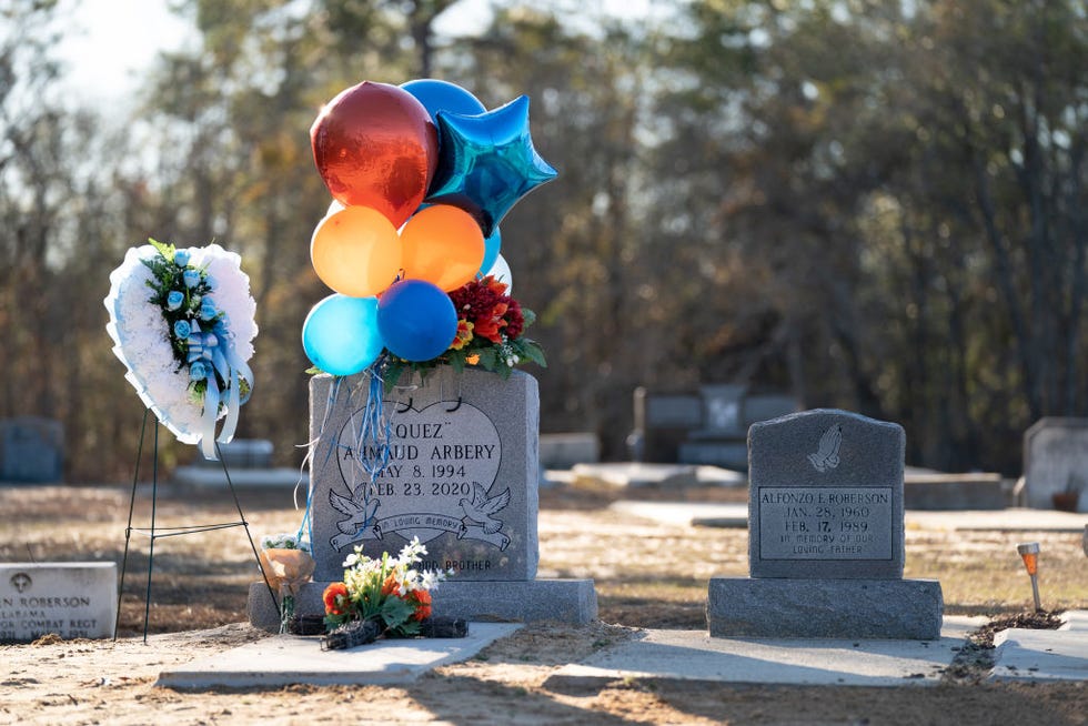 candlelight vigil held for ahmaud arbery on the one year anniversary of his death