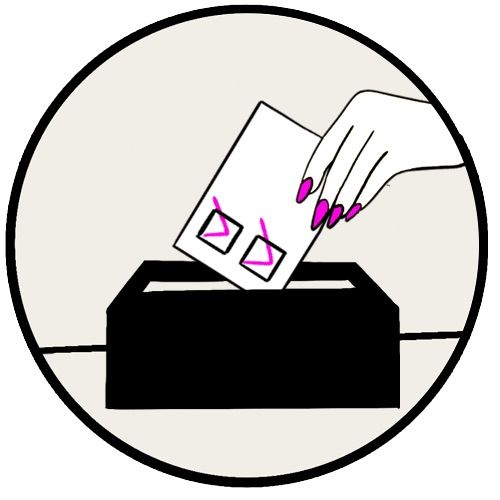 a woman putting a ballot into a ballot box