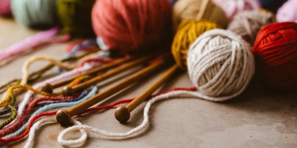balls of wool and knitting needles