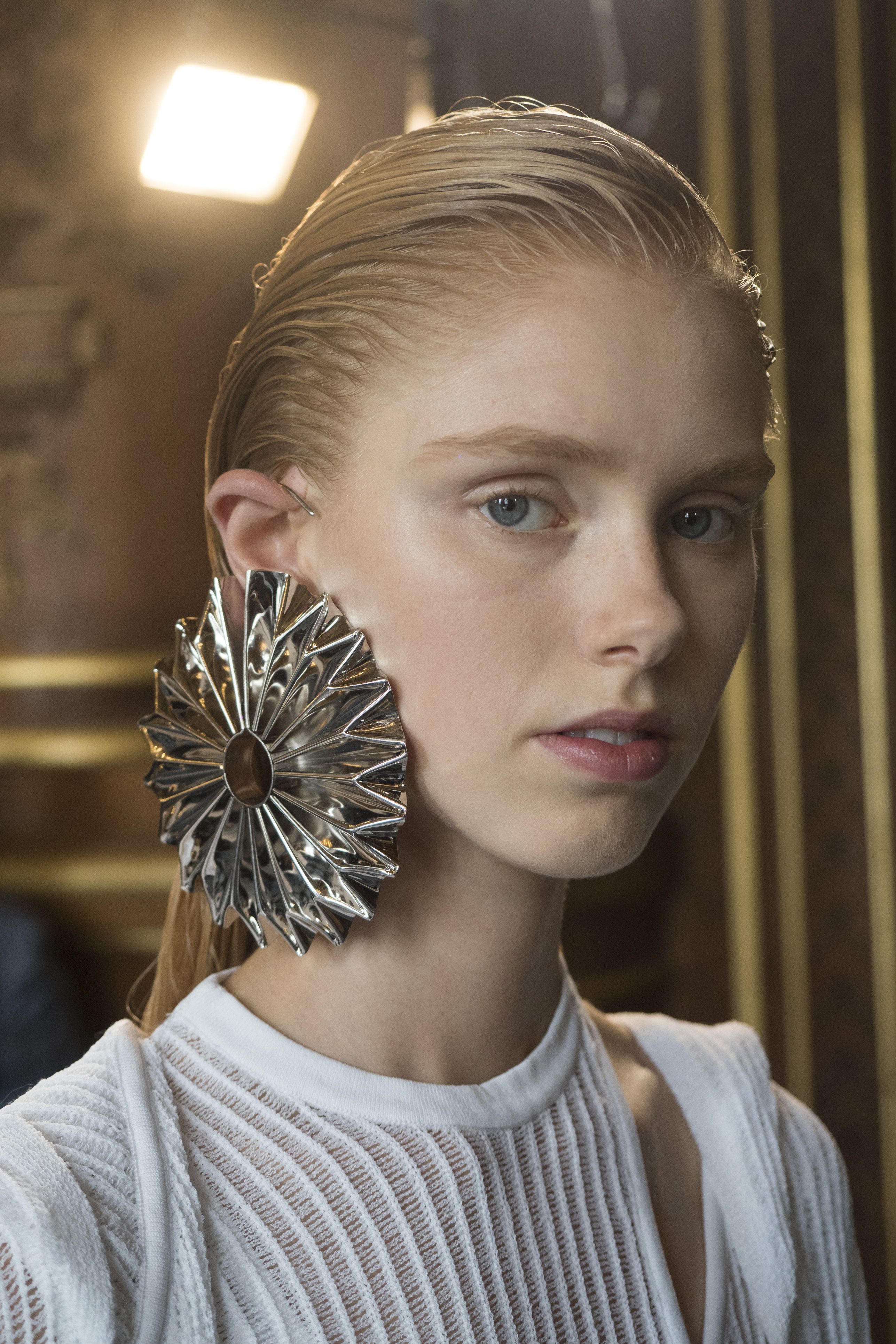 Street Style - Paris Fashion Week Womenswear Fall/Winter 2019/2020, guest  with hair decoration, dreadlock hair style, metallic blue jacket, seen  Stock Photo - Alamy