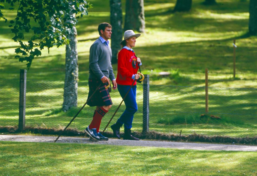 Prince Andrew, The Duke of York, and Sarah, The Duchess of York, walking near Balmoral Castle.