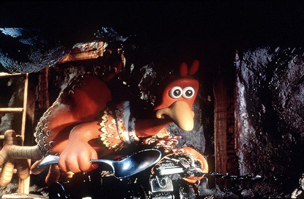 a hen works on her escape in a scene from chicken run, a good housekeeping pick for best movies for kids and toddlers