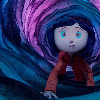 coraline crawls through a tunnel in a scene from coraline a good housekeeping pick for best scary movies for kids