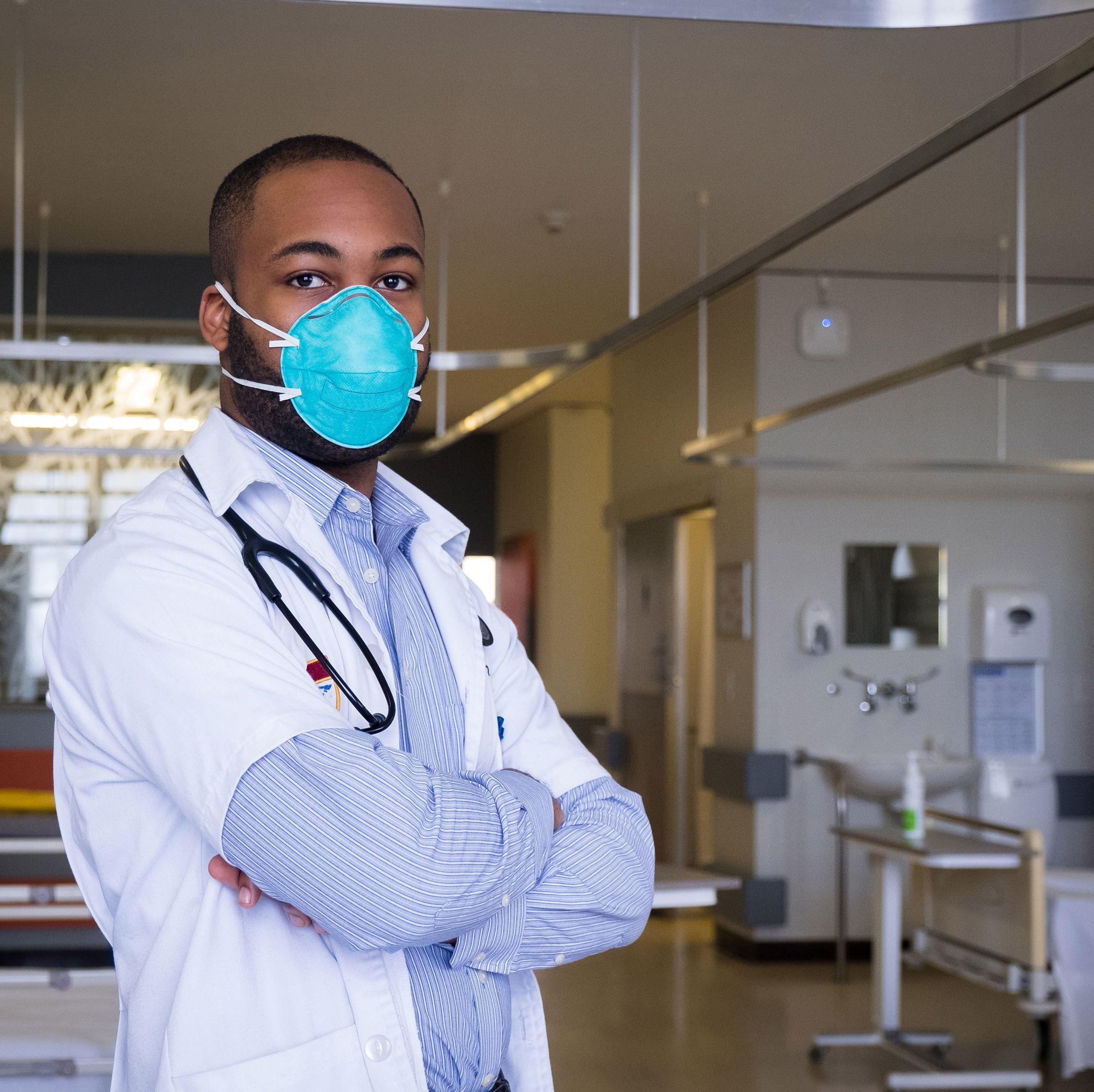portrait of a young male healthcare worker wearing a protective mask the corona virus outbreak around the world is a serious pandemic confident male doctor with face mask