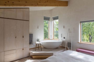 dormitorio con bañera