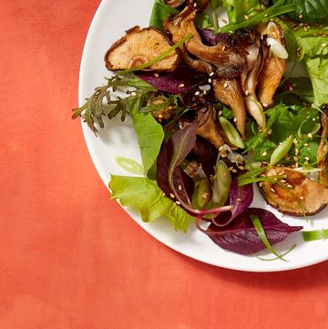 roasted mushrooms on greens with miso dressing and banana and coconut baked tempeh