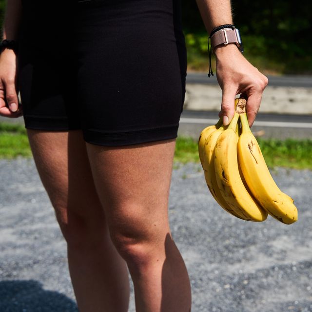 a runner holding a bunch of bananas