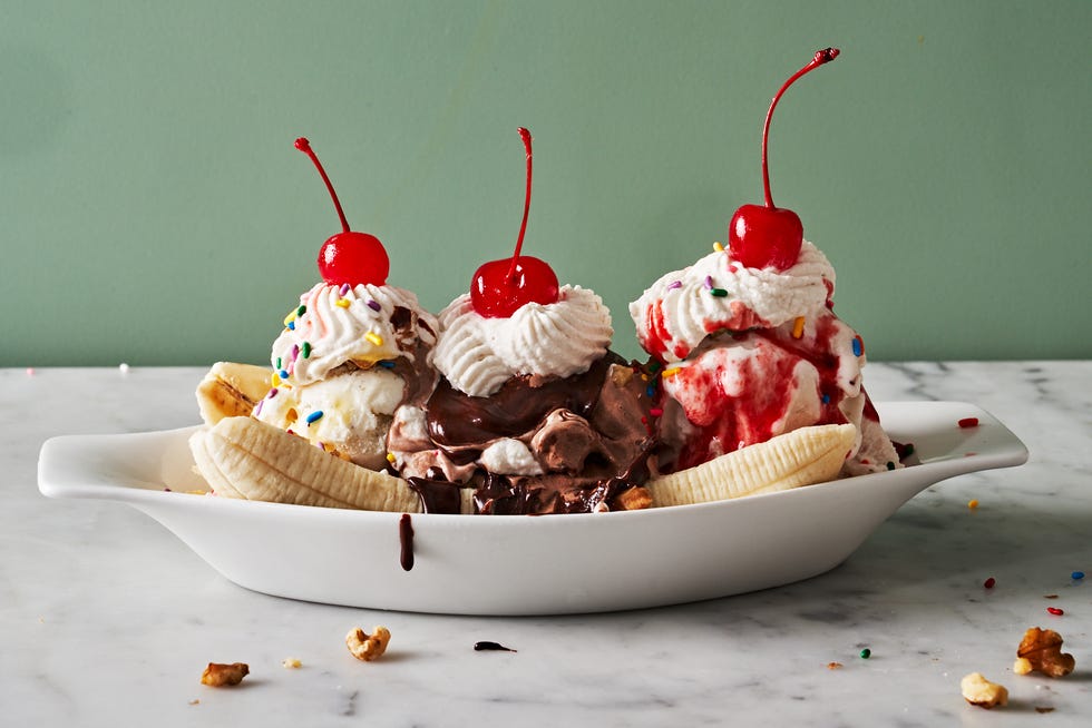 banana split with chocolate sauce and strawberry syrup