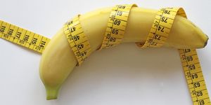 banana with measurement tape diet and healthy concept