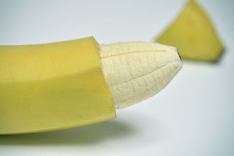 banana with the skin of its tip removed