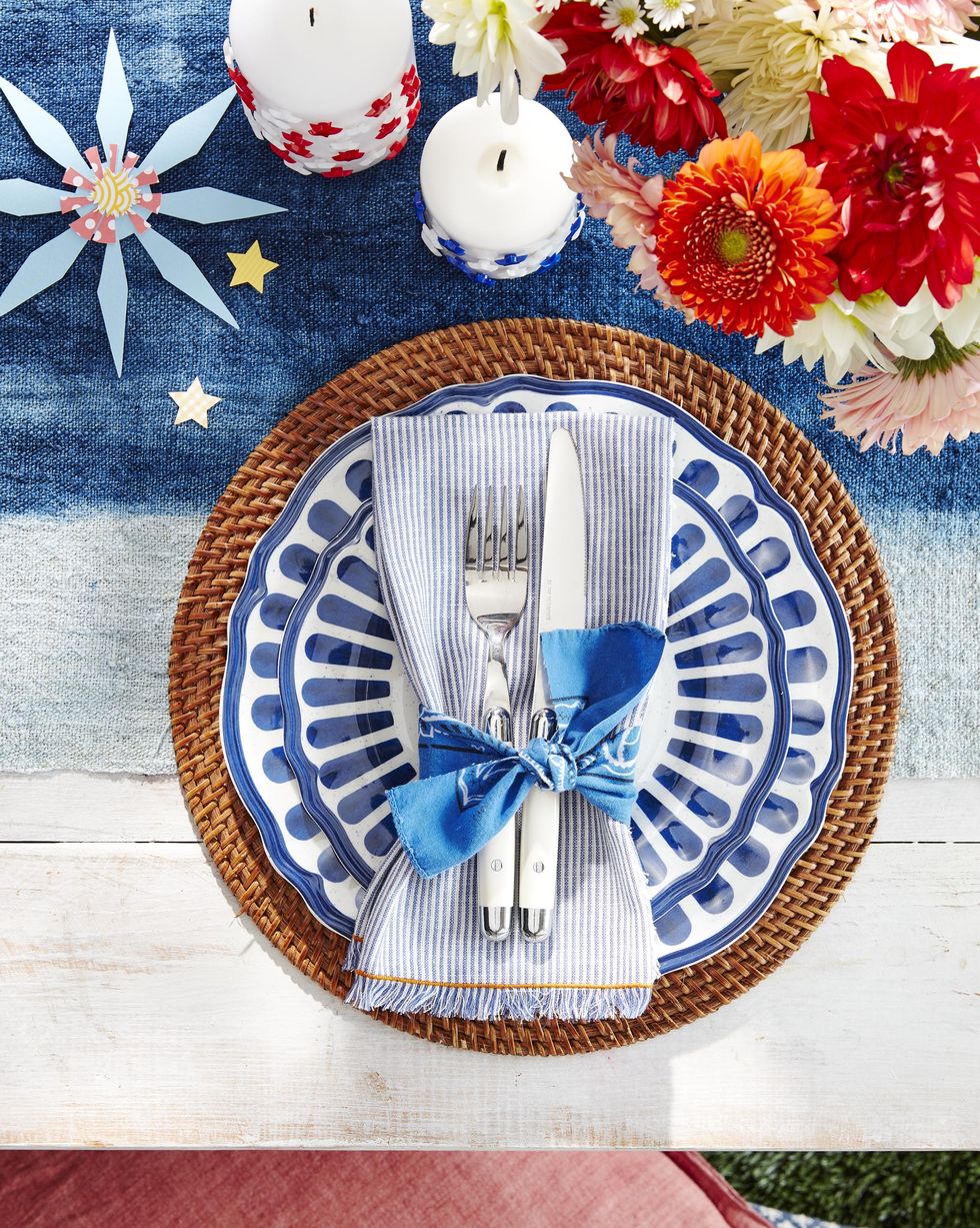 strips of torn bandana make for homespun ties on fringed, striped napkins $8 each potterybarncom atop painterly melamine pg 38 and a woven charger $18 potterybarncom