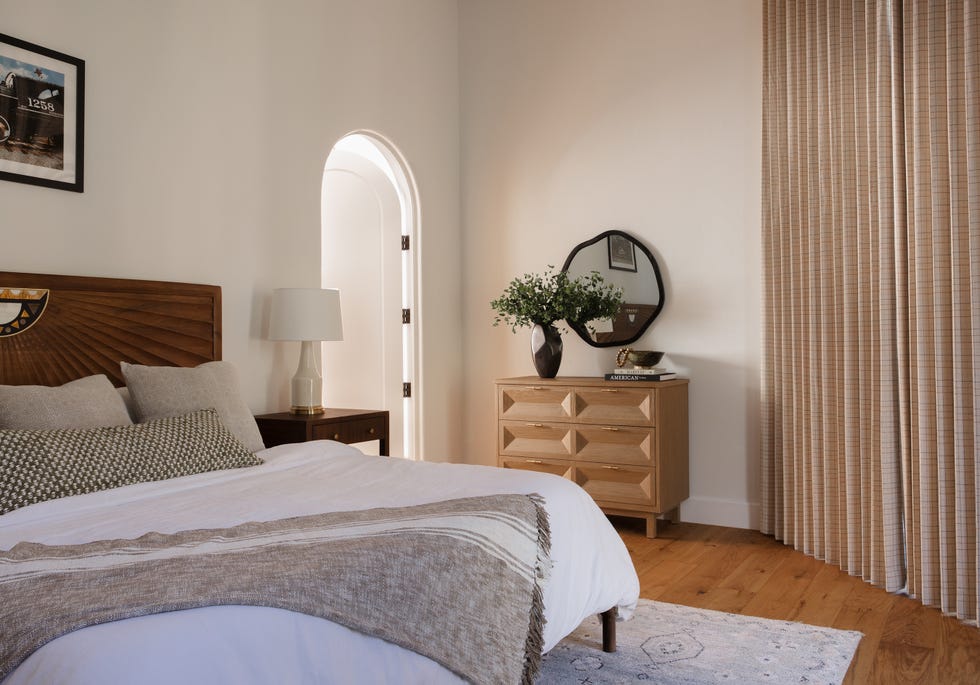 modern bedroom interior with wooden furniture and decorative elements