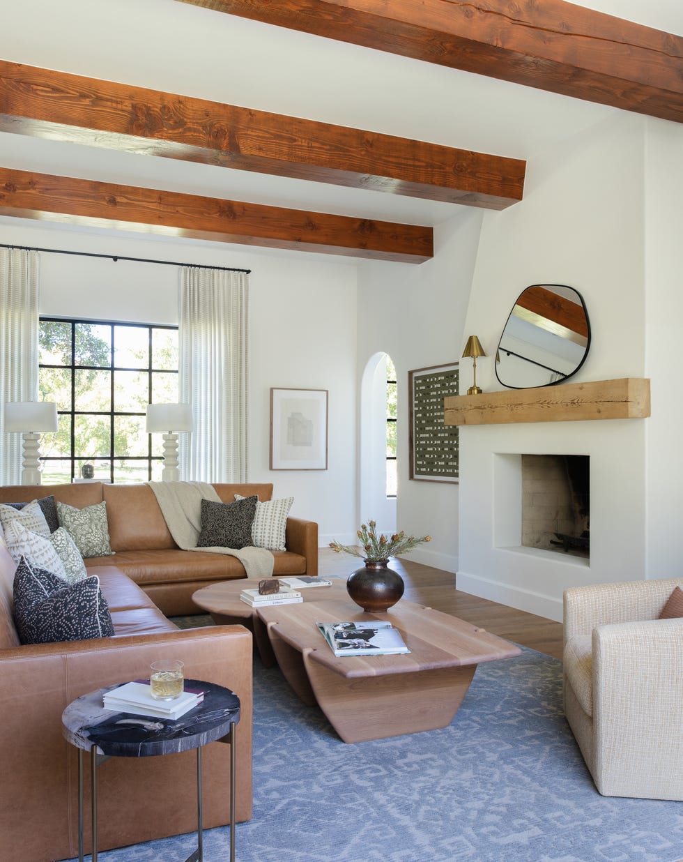 living room with wood beam ceiling