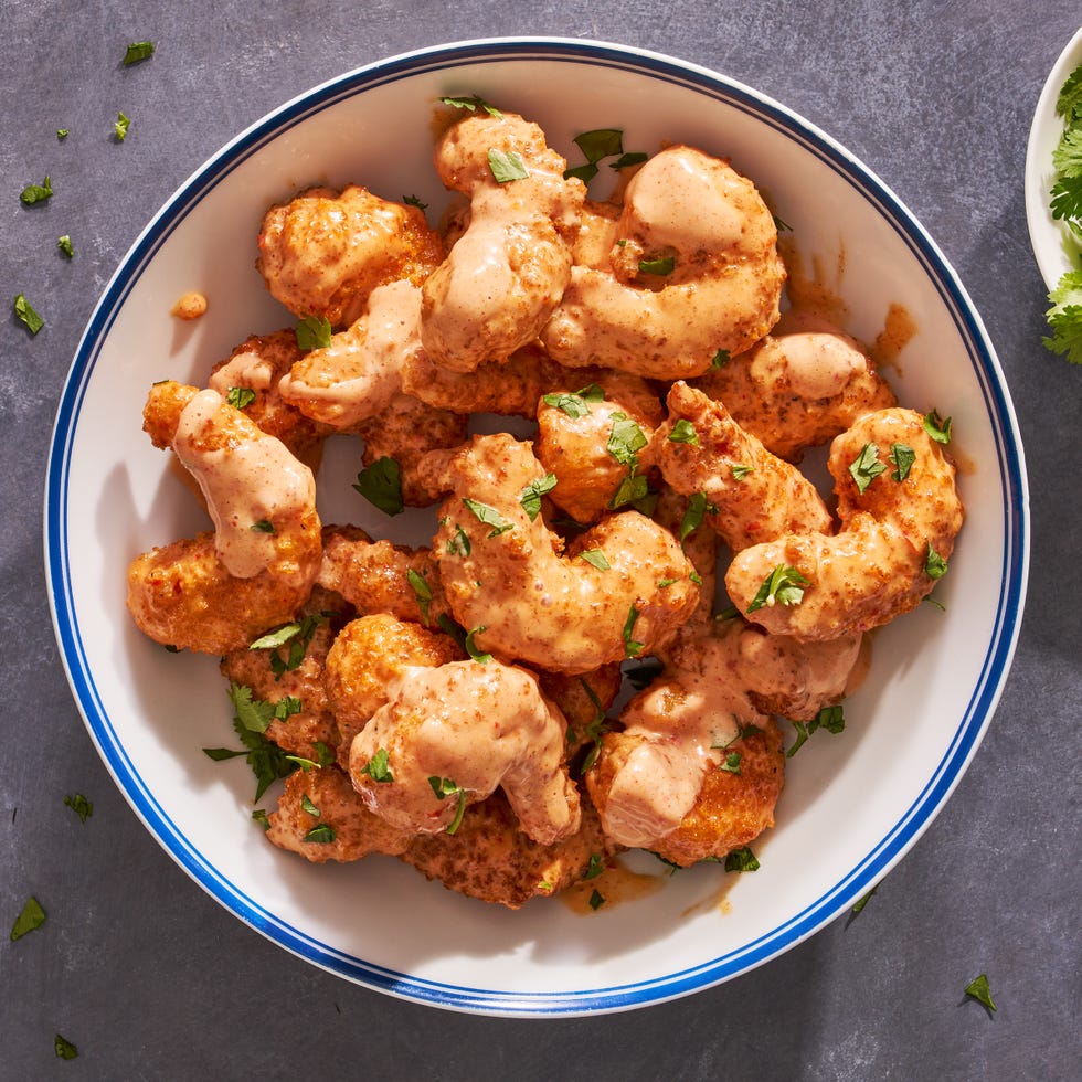 bang bang shrimp in a creamy spicy sauce with chopped cilantro