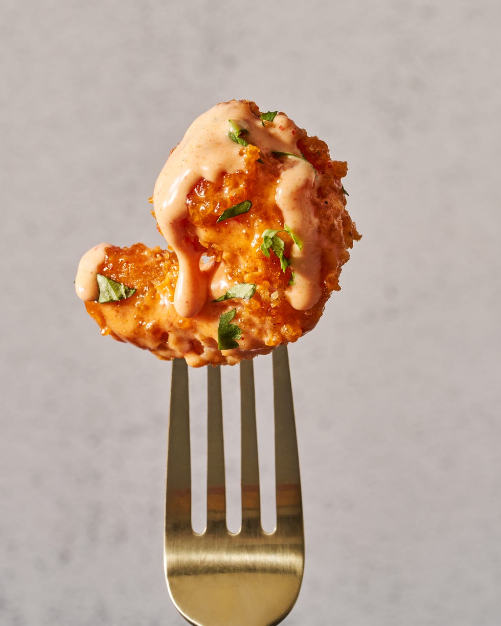 bang bang shrimp in a creamy spicy sauce with chopped cilantro